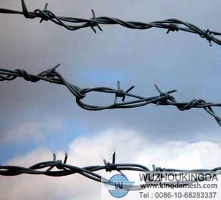 Barbed wire barrier